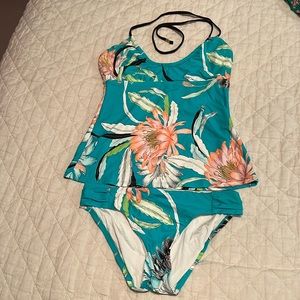 Trina Turk Tankini Black/Coral/Turquoise Print with tie neck and ruched bottoms